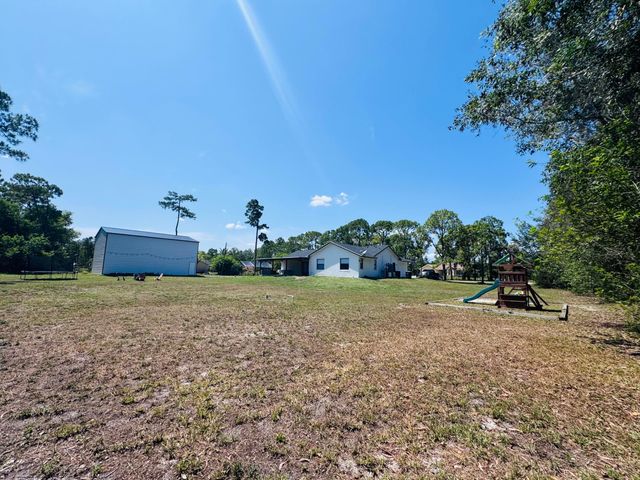 14196 N 77TH Place N, The Acreage, FL 33470