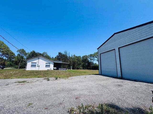 14196 N 77TH Place N, The Acreage, FL 33470