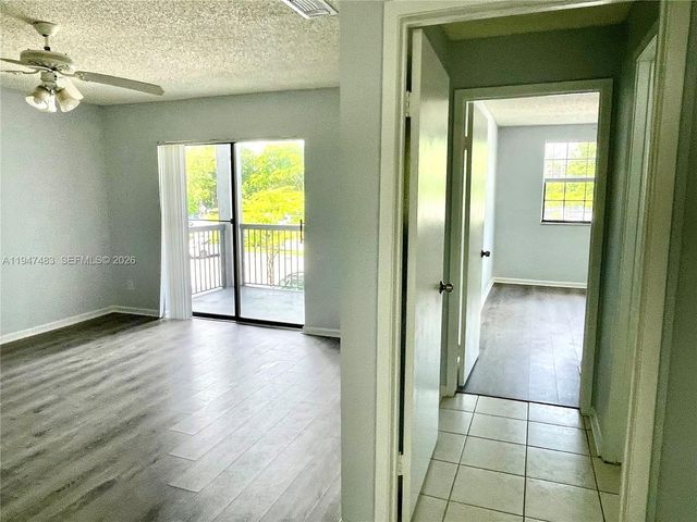 11211 W Atlantic Blvd 202, Coral Springs, FL 33071
