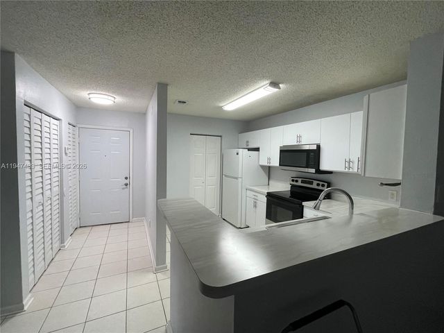 11211 W Atlantic Blvd 202, Coral Springs, FL 33071