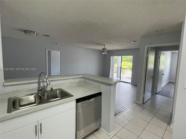 11211 W Atlantic Blvd 202, Coral Springs, FL 33071