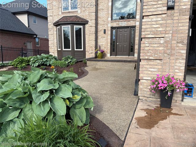 50374 Nesting Ridge Drive, Macomb Township, MI 48044