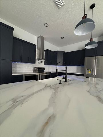4228 FOXWOOD BOULEVARD, Wesley Chapel, FL 33543