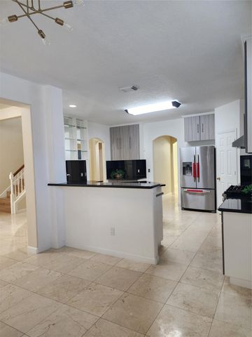 12303 Doe Meadow Drive, Stafford, TX 77477