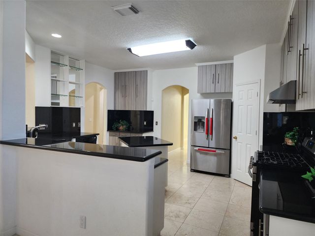 12303 Doe Meadow Drive, Stafford, TX 77477