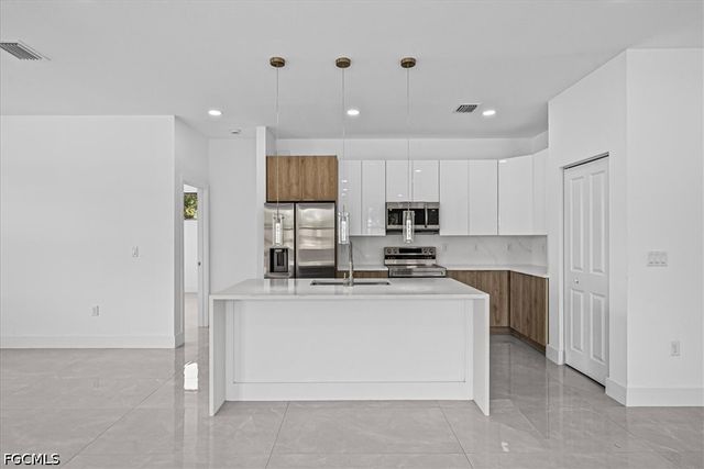 3001 Unice AVE S, Lehigh Acres, FL 33976