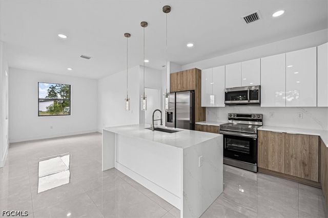 3001 Unice AVE S, Lehigh Acres, FL 33976