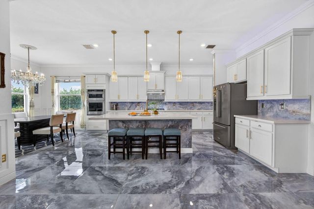 984 Sterling Pine Place, The Acreage, FL 33470