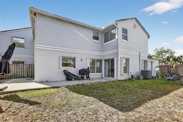 4700 Grapevine Way, Davie, FL 33331