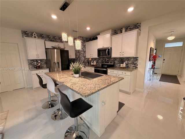 12422 SW Rimini Way, Port St. Lucie, FL 34987