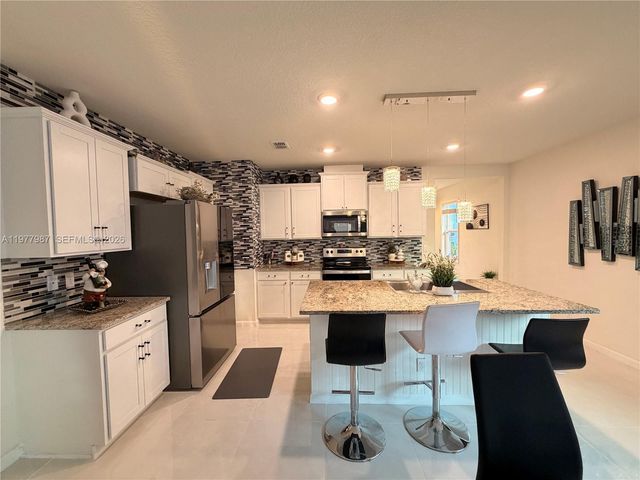 12422 SW Rimini Way, Port St. Lucie, FL 34987