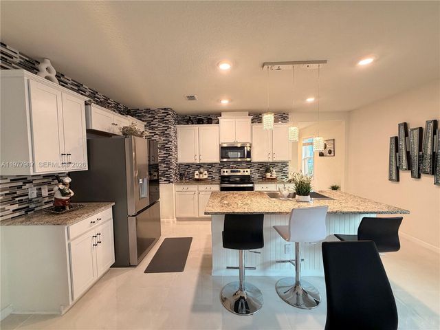 12422 SW Rimini Way, Port St. Lucie, FL 34987