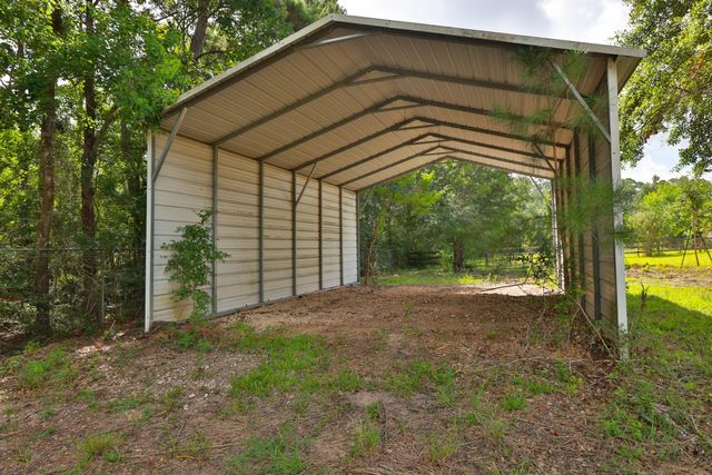 12002 Hillcrest Drive, Pinehurst, TX 77362