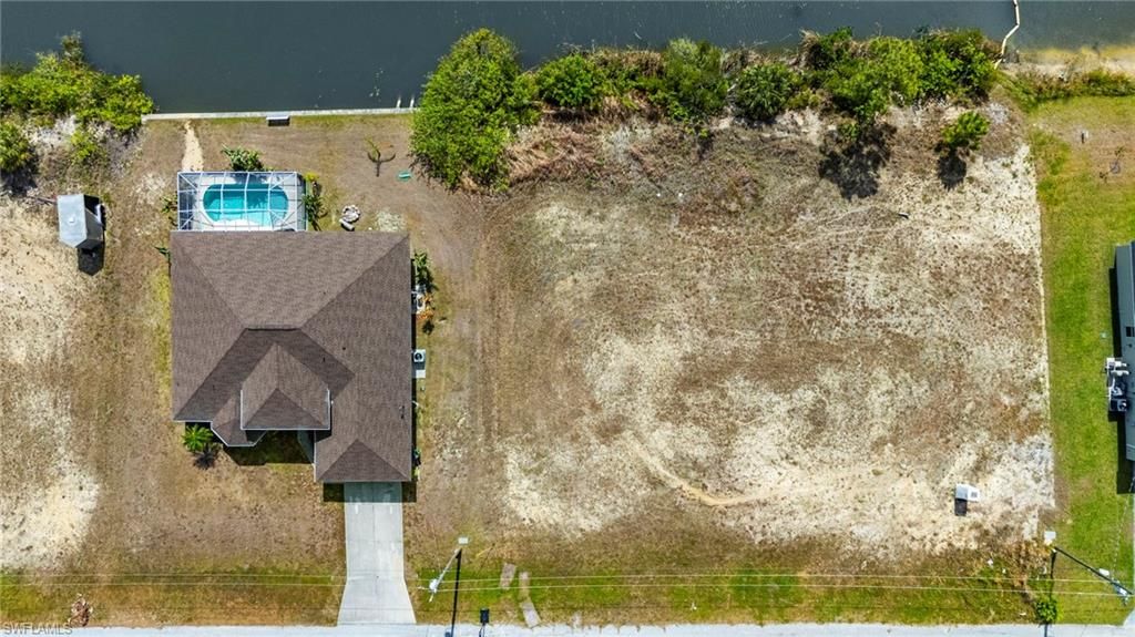 Image 5 of property listing at 1031 NW 23rd AVE, Cape Coral, FL 33993