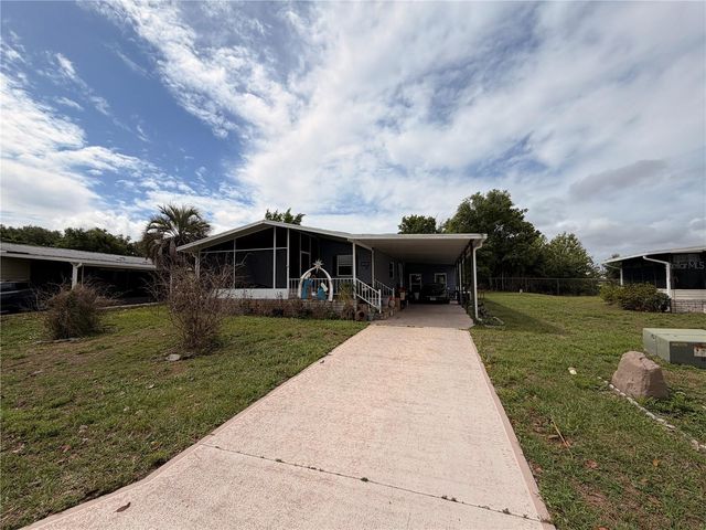 2032 CANOPY CIRCLE 148, Zellwood, FL 32798