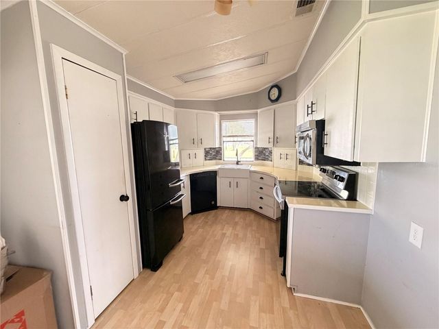 2032 CANOPY CIRCLE 148, Zellwood, FL 32798