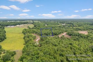 6225 Wilden Ridge Drive NE, Ada, MI 49301