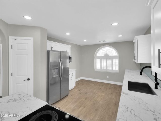 9437 E CHAMPAGNE Drive, Sun Lakes, AZ 85248