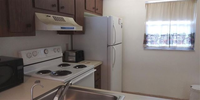 9340 Lagoon Place 302, Davie, FL 33324