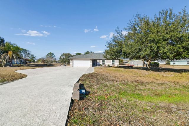 31609 HUNT CLUB LANE, Wesley Chapel, FL 33543