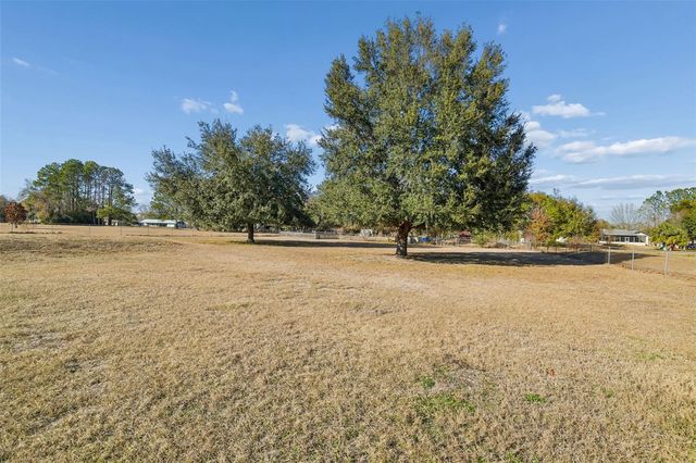 31609 HUNT CLUB LANE, Wesley Chapel, FL 33543