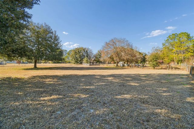 31609 HUNT CLUB LANE, Wesley Chapel, FL 33543