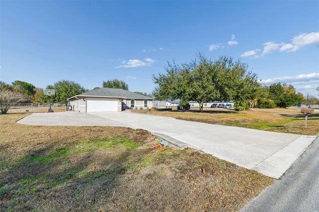 31609 HUNT CLUB LANE, Wesley Chapel, FL 33543