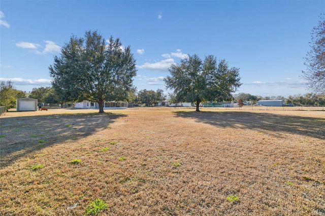 31609 HUNT CLUB LANE, Wesley Chapel, FL 33543