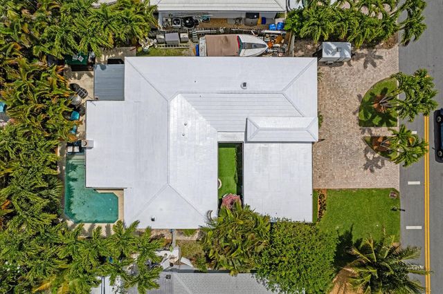 1166 Beach Road, Singer Island, FL 33404