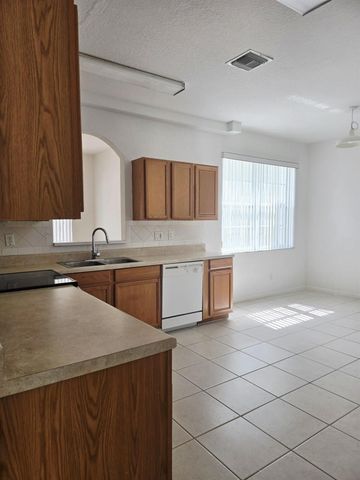 10589 NW 56th Pl, Coral Springs, FL 33076