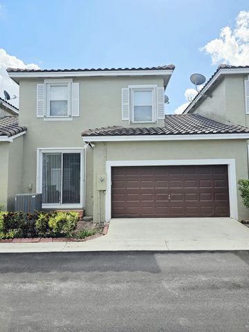 10589 NW 56th Pl, Coral Springs, FL 33076