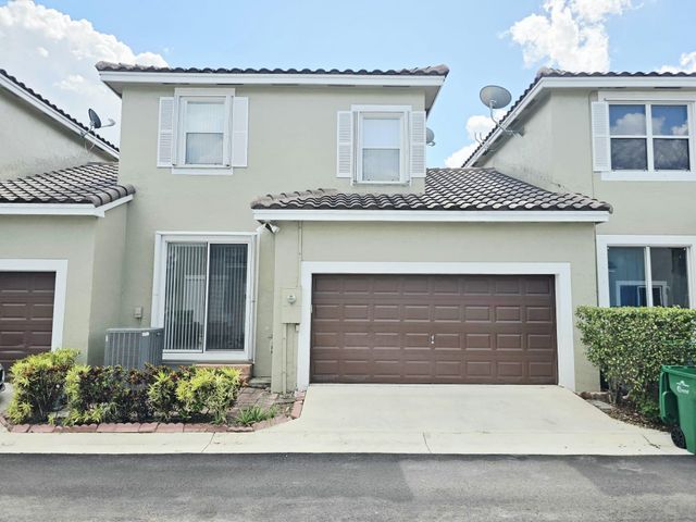 10589 NW 56th Pl, Coral Springs, FL 33076