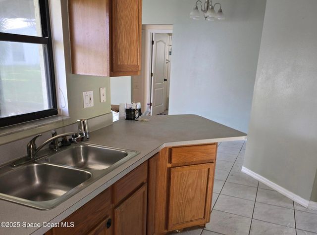 7747 Greenboro Drive, Melbourne, FL 32904