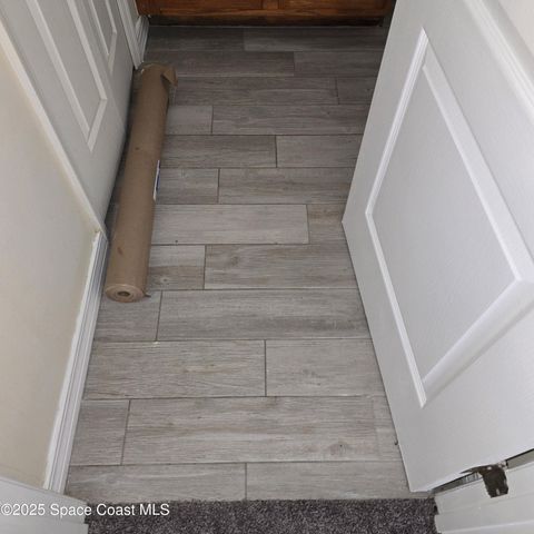 7747 Greenboro Drive, Melbourne, FL 32904