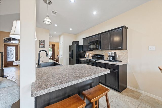 12555 Canyon Falls Boulevard, Willis, TX 77318