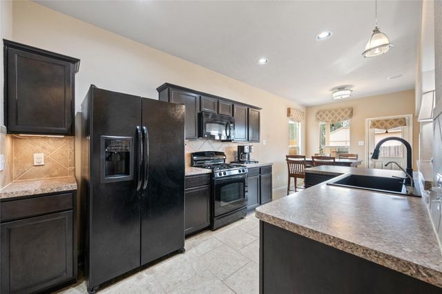 12555 Canyon Falls Boulevard, Willis, TX 77318