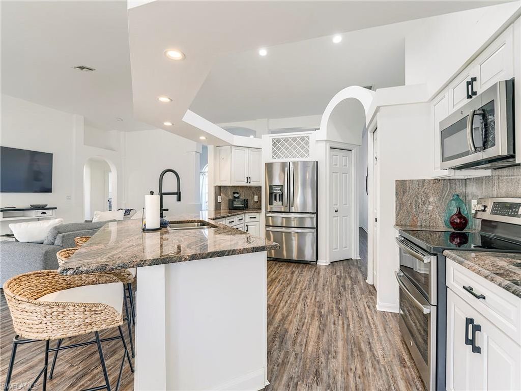 Image 16 of property listing at 1190 SW 57th ST, Cape Coral, FL 33914