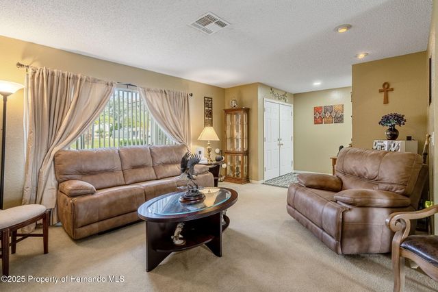 8158 Winding Oak Lane, Spring Hill, FL 34606