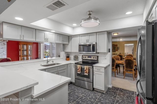 8158 Winding Oak Lane, Spring Hill, FL 34606