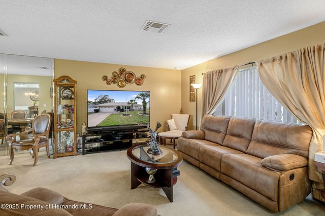 8158 Winding Oak Lane, Spring Hill, FL 34606