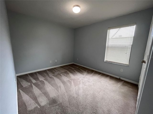 6007 SCOTCHWOOD GLEN 31, Orlando, FL 32822