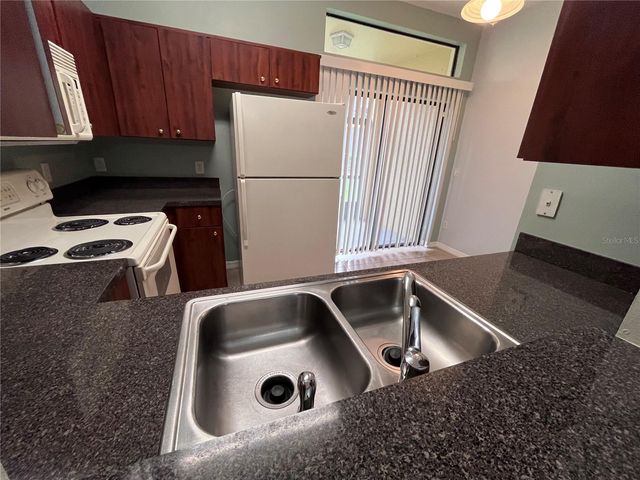 6007 SCOTCHWOOD GLEN 31, Orlando, FL 32822