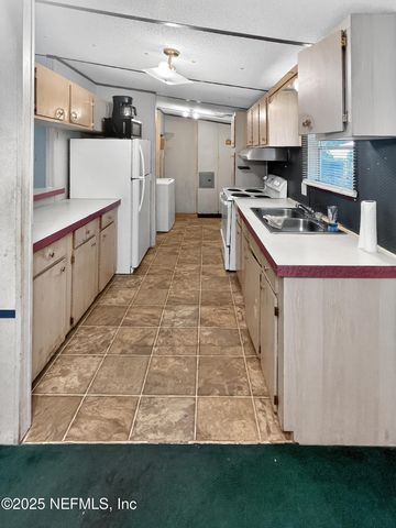 202 CLEARWATER Road, Satsuma, FL 32189