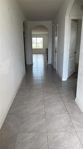 521 NICKEN GROVE, Davenport, FL 33837