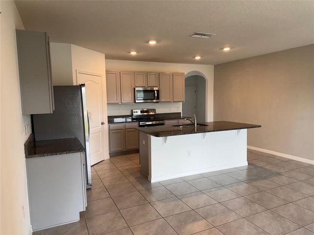 521 NICKEN GROVE, Davenport, FL 33837