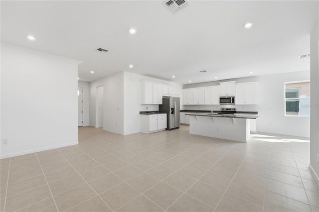 504 GREEN TRACKER AVENUE, Groveland, FL 34736