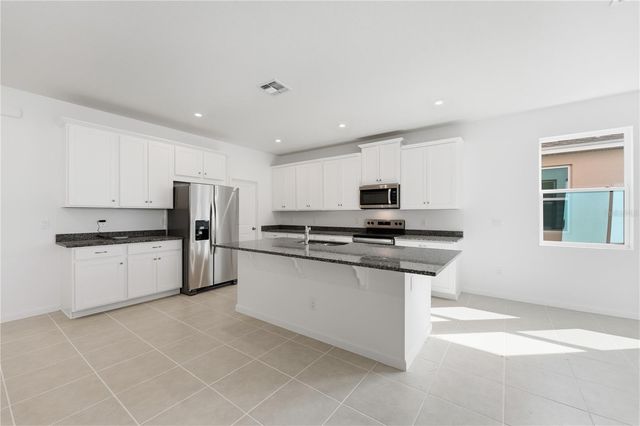 504 GREEN TRACKER AVENUE, Groveland, FL 34736