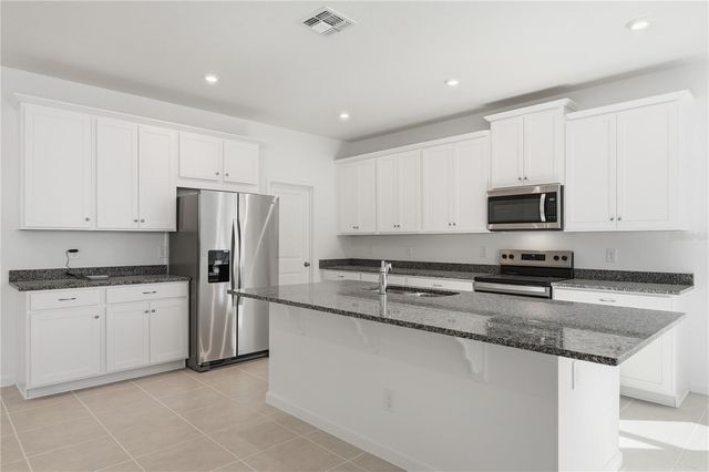 504 GREEN TRACKER AVENUE, Groveland, FL 34736