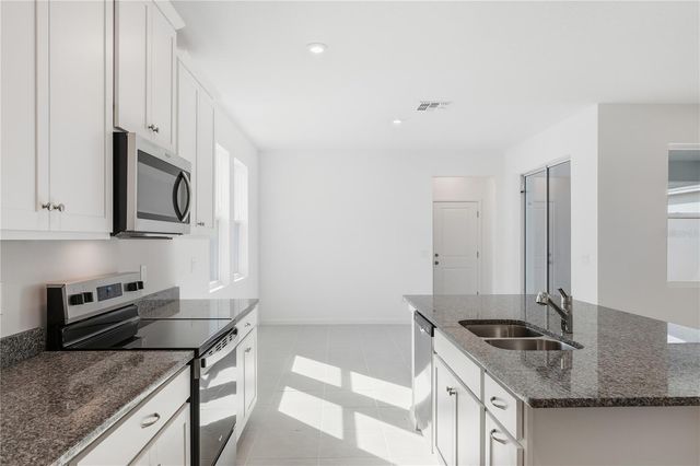 504 GREEN TRACKER AVENUE, Groveland, FL 34736