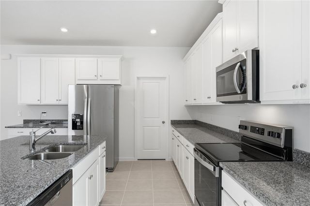 504 GREEN TRACKER AVENUE, Groveland, FL 34736